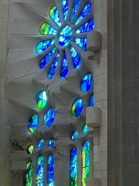 Blue mosaic glass of sunrise at La Sagrada Familia